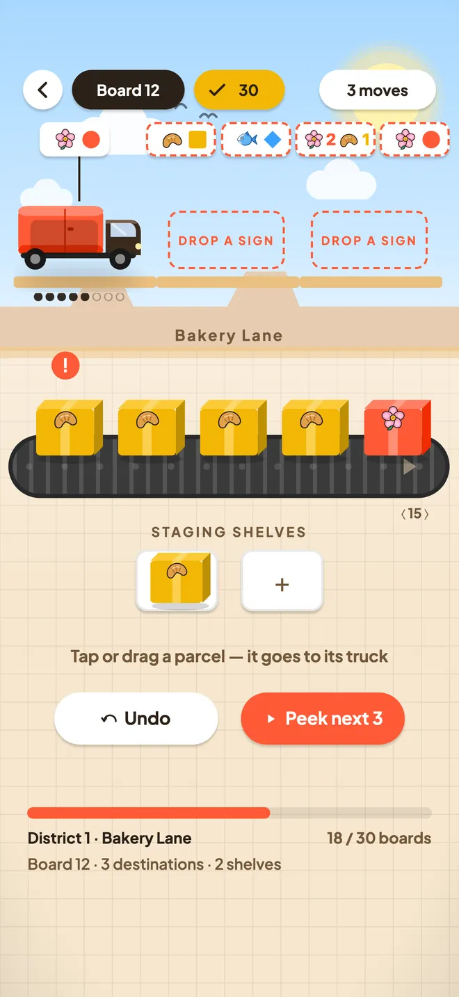 A board in Bakery Lane: the red truck at the dock with the signs above it, bread parcels coming along the belt and one parcel on the staging shelves